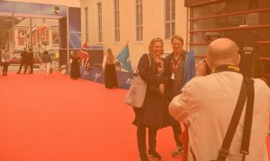 Petri Kemppinen and Valeria Richter are being photographed at the red carpet of Haugesund Film Festival.